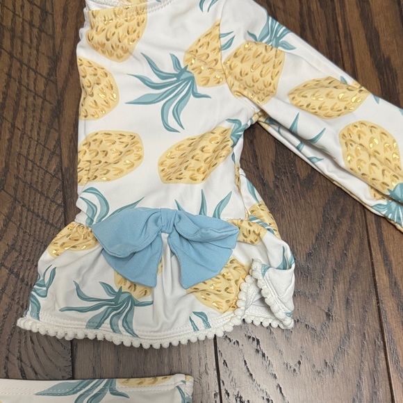 Tommy Bahama Pineapple Print Baby Swim Set with Blue Bow - Picture 7 of 8